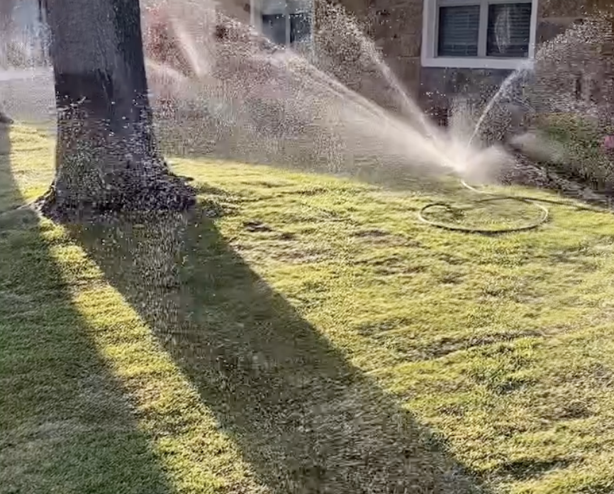 Fixed irrigation system in Broken Arrow residential lawn